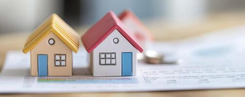 Miniature Houses on a Document photo