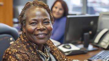 Smiling Mature Woman in Orange Brown Patterned Jacket at Office photo