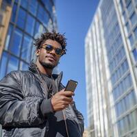 Stylish Young Man Using Smartphone in Modern City photo
