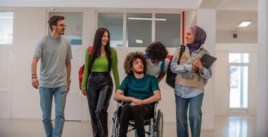 A group of happy diverse college students talking to each other while they walk in the university hallway. photo