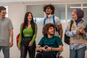A group of happy diverse college students talking to each other while they walk in the university hallway. photo