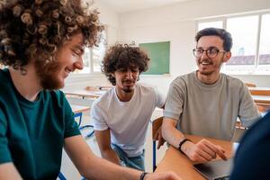 A group of happy diverse college students studying together in the classroom. photo