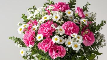 A vase filled with pink and white flowers photo