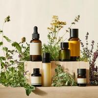 Herbal oils and essential oils on wooden blocks photo