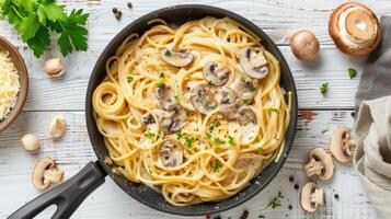 Spaghetti with mushrooms and parmesan cheese photo