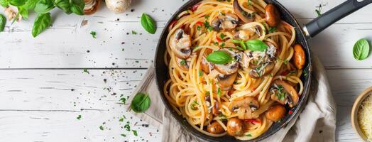 Spaghetti with mushrooms and vegetables photo