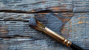 A brush on a wooden surface photo