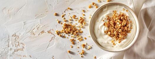 Yogurt with granola on a white background photo