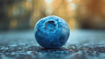 A blueberry on a table. photo