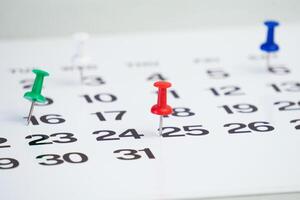 schedule calendar with colorful pin background photo