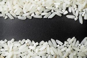 rice grain frame on black background photo