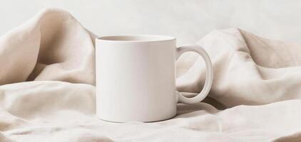 white coffee mug on linen covered podium, perfect for showcasing designs photo