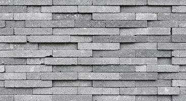 A brick wall with many different colors photo