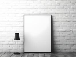 A blank frame on a wall in front of a lamp photo