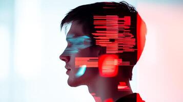 Profile of programmer with code and data visualization overlay, representing the process of software development and coding photo
