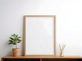Mock up of a blank frame on a shelf with a plant photo