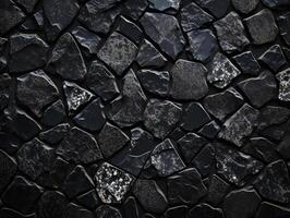 A black stone wall with many different shapes photo