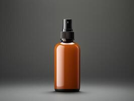 An orange bottle with a sprayer on a gray background photo