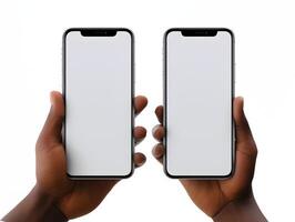 Two hands holding two iphones with blank screens photo