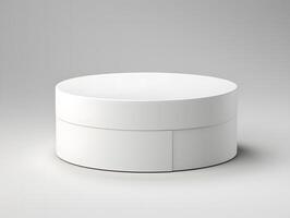 A white round table with a drawer on top photo