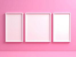 Three empty white frames on a pink wall photo