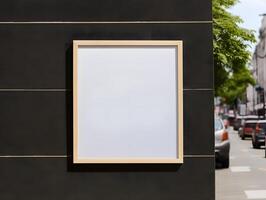 A blank frame is mounted on the side of a building photo
