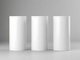 Three white empty containers on a gray background photo