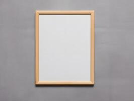A blank wooden frame on a wall photo