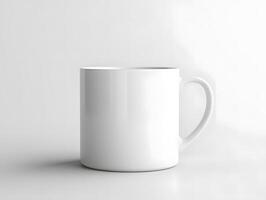 A white mug is sitting on a table photo