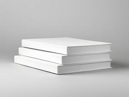 Three white books stacked on top of each other photo