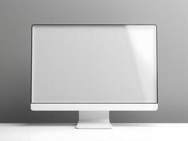 A white computer monitor with a blank screen photo