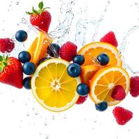 Vibrant assortment of fresh fruits splashing in water creates a refreshing scene in a bright setting photo