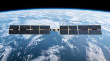 Advanced satellite in orbit with solar panels against Earth backdrop photo