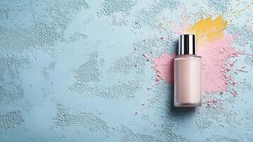 Artistic mock up of cosmetic bottle with colorful splash on blue background photo
