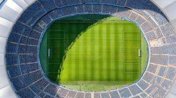 Aerial view of large sports stadium filled with fans during game photo