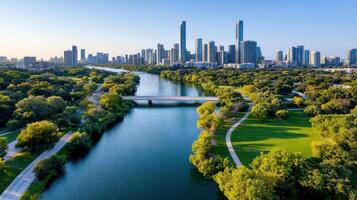 Aerial view of vibrant cityscape with river and green parks photo