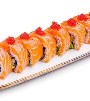 Delicious sushi platter with fresh salmon and roe on display photo