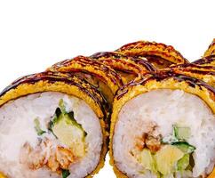 Tempura maki sushi rolls showing ingredients on white background photo