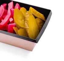 Colorful assortment of pickled vegetables in a container photo