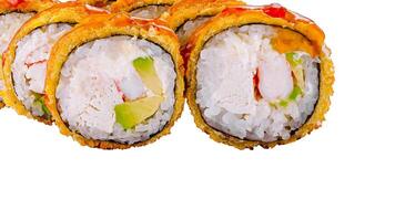 Close up Tempura maki sushi rolls with sauce on white background photo