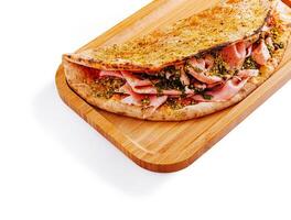 Delicious sandwich with ham and spices on wooden board photo