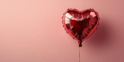 Red heart-shaped balloon floating against a soft pink background creates a romantic atmosphere for special occasions photo