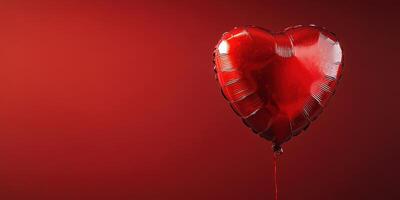 Red heart-shaped balloon against a bold background perfect for romantic celebrations or special occasions photo