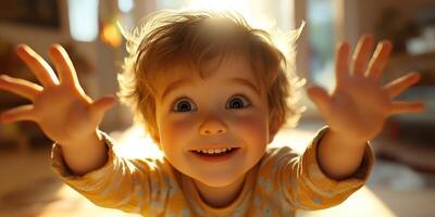 Happy toddler with outstretched hands playing in a sunlit room during the late afternoon photo