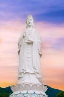 The famous big white statue of Lady Buddha in Da Nang at Linh Ung Pagoda in Vietnam in Asia photo