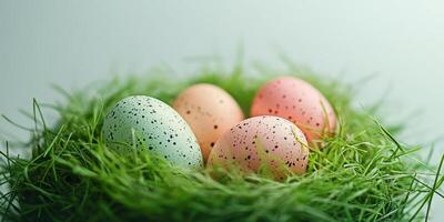 Colorful Easter eggs resting in a cozy nest made of bright green grass during springtime celebrations photo