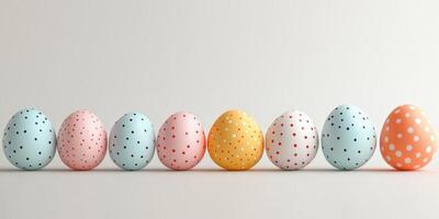 Colorful polka dot eggs lined up on a neutral surface decorated for spring celebration photo