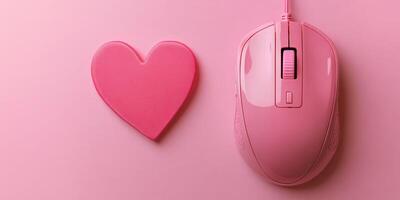 Pink gaming mouse and heart-shaped object on pastel pink surface creating a playful and modern aesthetic photo