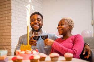 Toasting with wine while fireworks sparkling photo