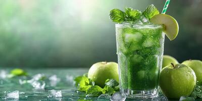 Refreshing green apple drink garnished with mint leaves served on a textured table photo